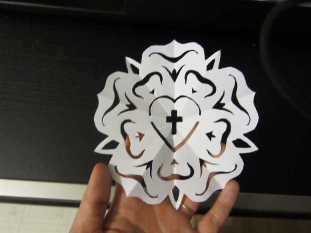 How to make a Luther rose paper snowflake cut-out!